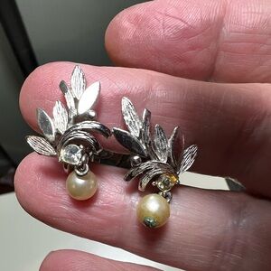 Vintage Avon clip on earrings in silver tone with leaf design, faux pearl.